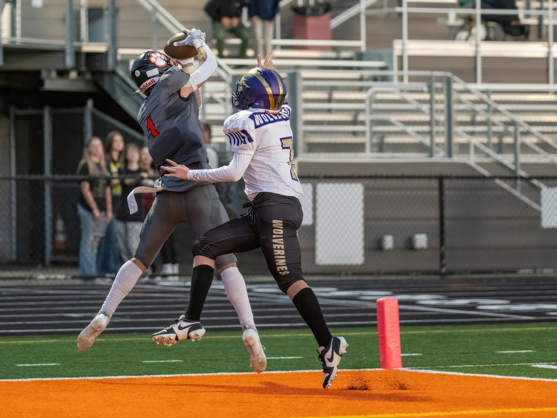 #1 Johnathan Roberts heaves in a pass over a Friday Harbor Wolverines player. 