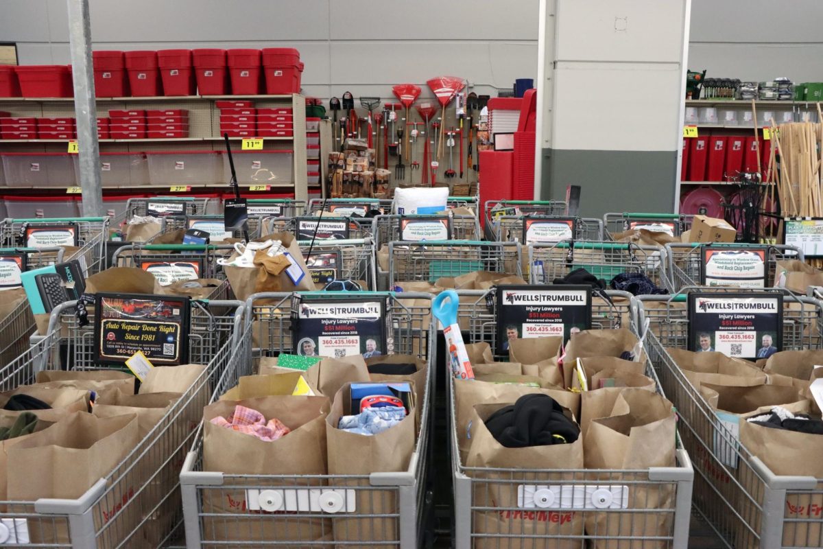Using money from donations, Granite Falls Students & Staff shop for local families in need. 
